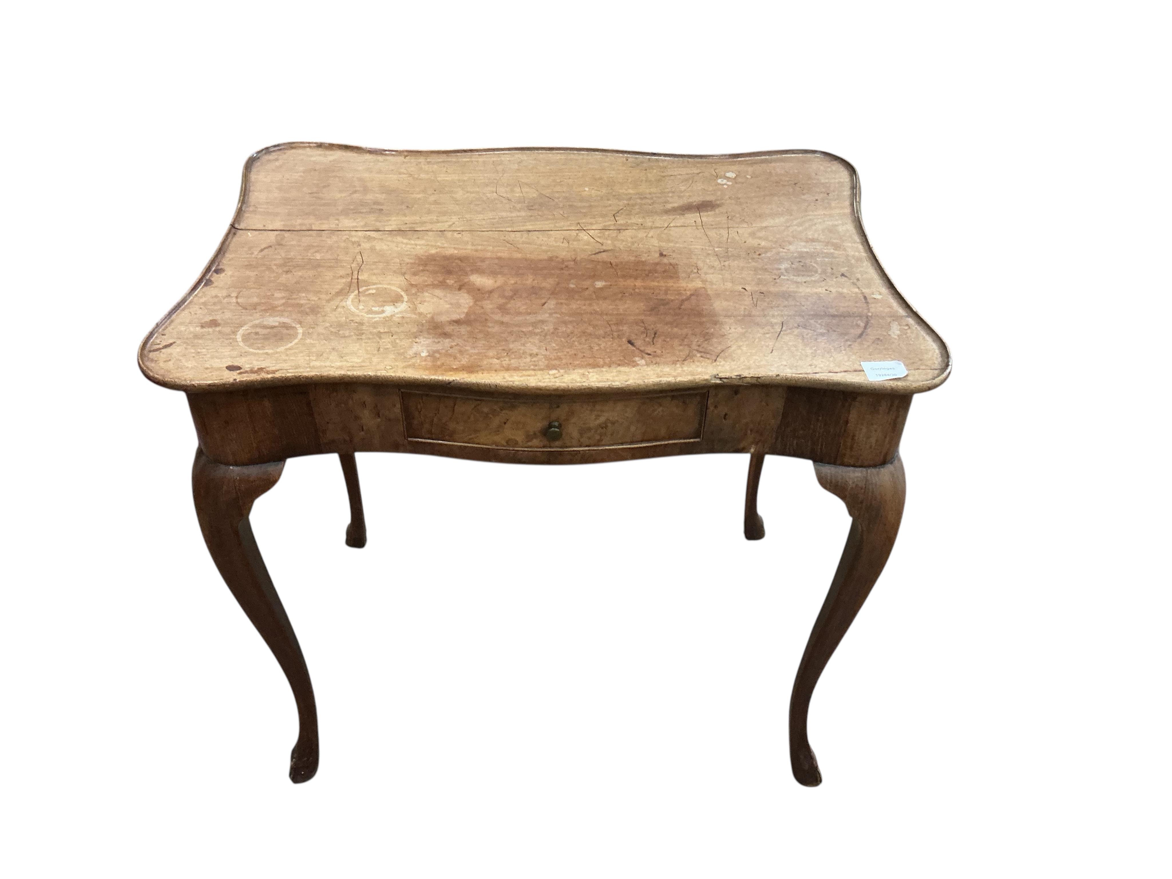 An 18th century rectangular mahogany serpentine side table, fitted with a single drawer, on cabriole legs, width 78cm, depth 53cm, height 72cm